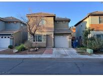 Inviting two-story home with manicured lawn and cozy curb appeal at 5281 Starter Ave, Las Vegas, NV 89156