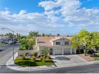 Charming two-story home with a three-car garage and well-manicured landscaping at 7984 Laurena Ave, Las Vegas, NV 89147