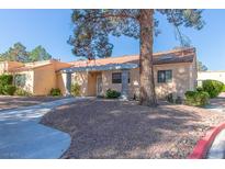 Inviting single-story home with a charming pergola-covered entrance and well-maintained landscaping at 2851 S Valley View Blvd # 1195, Las Vegas, NV 89102