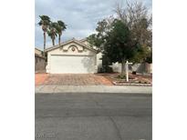 Charming single-story home with a two-car garage and tile driveway at 3729 Bronco Billy Ct, Las Vegas, NV 89129