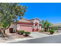 Charming one-story home featuring desert landscaping, a covered entry, and a two-car garage at 8250 Lincoln Valley St, Las Vegas, NV 89123