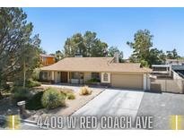 Charming single-story home with desert landscaping, two-car garage and a spacious driveway at 4409 W Red Coach Ave, North Las Vegas, NV 89031