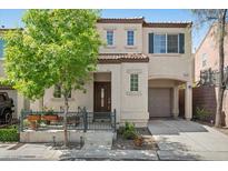 Charming two-story home with a well-maintained front yard and covered porch at 6729 Churnet Valley Ave, Las Vegas, NV 89139