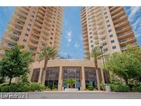 Luxury high-rise building featuring modern architecture, lush landscaping, and a grand entrance at 8255 Las Vegas Blvd # 611, Las Vegas, NV 89123