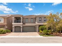 Charming two-story home with a three-car garage and cozy balcony at 8275 Old Creek Ranch St, Las Vegas, NV 89139