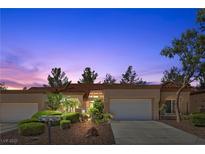 Charming single story home with desert landscaping, two-car garage, and a red tile roof, perfect for relaxed living at 8629 Prairie Hill Dr, Las Vegas, NV 89134