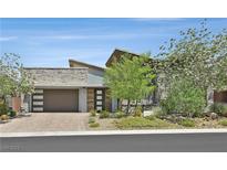 Beautiful single-story home with desert landscaping and a stone facade at 6184 Willow Rock St, Las Vegas, NV 89135