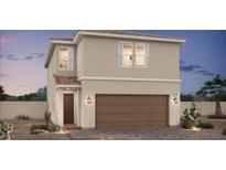 Two-story home featuring a brown garage door, desert landscaping, and a covered porch entry at 8119 Beebrush Ct, Las Vegas, NV 89113