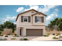 Charming two-story home with a two-car garage and desert landscaping, perfect for low-maintenance living at 1042 Ferodale Ave, North Las Vegas, NV 89084