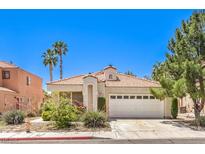 Charming single-story home with desert landscaping and a two-car garage at 2753 Port Of Call Dr, Las Vegas, NV 89128