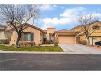 Charming single-story home features a two-car garage, landscaped front yard, and stucco exterior at 4996 Del Pueblo Ave, Las Vegas, NV 89141