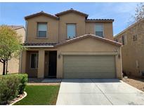 Two-story home with a two car garage and manicured landscaping in a suburban neighborhood at 7788 Soda Canyon St, Las Vegas, NV 89139