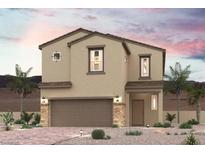 Charming two-story home featuring desert landscaping and a two-car garage with stone accents at 9958 Ruby Dome Ave, Las Vegas, NV 89178