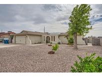 Charming single-story home with desert landscaping and an inviting arched entryway at 1491 Sunrise View Dr, Las Vegas, NV 89110
