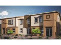 Modern two-story home featuring desert landscaping, a neutral palette, and an inviting facade at 2534 Petunia Garden St # 222, North Las Vegas, NV 89081