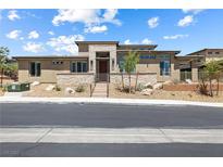Attractive single-story home showcasing manicured landscaping and a charming stone facade at 4140 Coneflower St, Las Vegas, NV 89135