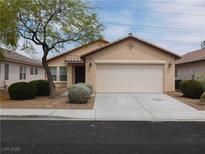 Charming single-story home featuring a two-car garage and well-maintained landscaping in a residential neighborhood at 7924 Pale Rider St, Las Vegas, NV 89131