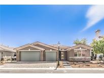 Attractive single-story home with a two-car garage, desert landscaping, and a charming street lamp at 8316 Broad Peak Dr, Las Vegas, NV 89131