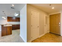 Modern kitchen features sleek cabinetry and granite countertops in a well-lit space at 150 Las Vegas Blvd # 2003, Las Vegas, NV 89101
