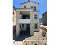 Charming two-story home with stone accents and a well-maintained, low-maintenance gravel front yard at 1533 Bat Hawk St, Las Vegas, NV 89144