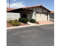 Charming single-story home featuring a two-car garage and low maintenance landscaping at 2100 Plaza Del Padre, Las Vegas, NV 89102