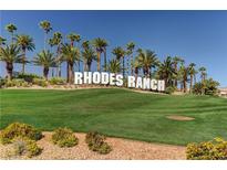 Expansive Rhodes Ranch signage surrounded by mature palms and vibrant green lawns at 248 Windmill Croft Dr, Las Vegas, NV 89148