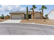 Single story home featuring desert landscaping, a two-car garage, and a tiled roof at 2612 Dearport Ct, Henderson, NV 89052