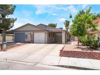 Charming single-story home with a well-maintained front yard and convenient carport at 25 Colbath St, Las Vegas, NV 89110