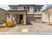 Charming two-story home with a welcoming front porch and a two car garage at 3854 Stadium Ave, Las Vegas, NV 89120