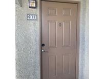 Neutral colored front door with house number 2033 at 4400 S Jones Blvd # 2033, Las Vegas, NV 89103