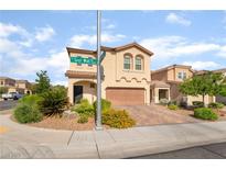 Charming two-story home with a brick driveway and well-maintained landscaping in a residential neighborhood at 7083 Seat Wall Rd, Las Vegas, NV 89148