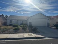 Charming single-story home with a two-car garage and well-maintained landscaping at , Henderson, NV 89014