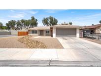 Charming single-story home with a two car garage and low maintenance desert landscaping at 4270 Wendy Ln, Las Vegas, NV 89115