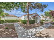 Charming single-story home with well-maintained landscaping and a cozy, inviting front yard at 5401 Bugle Way # 103, Las Vegas, NV 89108