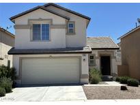 Two-story home featuring a two-car garage, neutral stucco, and a well-maintained yard at 7282 Quarterhorse Ln, Las Vegas, NV 89148
