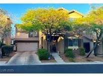 Charming two-story home with a well-maintained front yard and a two-car garage at 8340 Winterchase Pl, Las Vegas, NV 89143