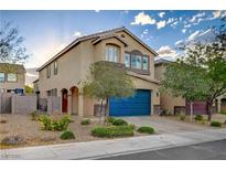 Charming two-story home with a well-manicured yard and a two-car garage, enhancing its curb appeal at 9327 S Chieftain St, Las Vegas, NV 89178