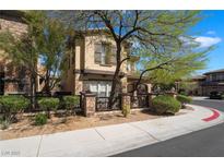 Charming two-story home boasts a well-manicured front yard and welcoming curb appeal at 10370 Sweet Laurel St St, Las Vegas, NV 89178