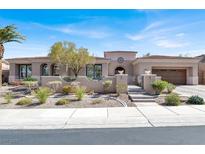 Stunning single-story home featuring a desert landscaped yard, gated entrance and a spacious two car garage at 1725 Cypress Manor Dr, Henderson, NV 89012