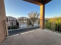 A cozy outdoor balcony with decorative railings offers a relaxing space with neighborhood views at 6545 Netherseal Ave, Las Vegas, NV 89139