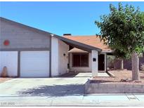 Inviting single story home showcasing its tidy front yard and well-maintained exterior at 7123 Kenwood St, Las Vegas, NV 89147