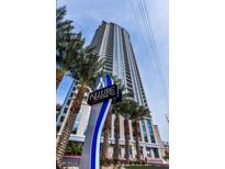 Exterior view of the Allure Las Vegas high rise condominium building, sign, and palm trees at 200 W Sahara Ave # 1703, Las Vegas, NV 89102