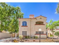 Charming condo featuring desert landscaping and a terracotta colored roof at 541 Indian Bluff St # 201, Las Vegas, NV 89145