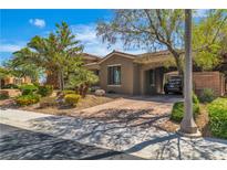 Charming home featuring desert landscaping, a brick-paved driveway, and covered parking at 6227 Orto Vaso Ave, Las Vegas, NV 89131