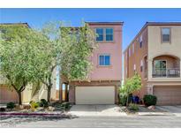 Charming two-story home with stucco exterior, attached garage, and mature landscaping at 6622 Colorado Spruce St, Las Vegas, NV 89149