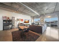 Bright open floor plan with modern finishes, polished concrete floors, and floor to ceiling windows with city views at 900 Las Vegas Blvd # 715, Las Vegas, NV 89101