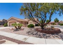 Charming single-story home featuring desert landscaping and a well-maintained front yard at 2114 High Mesa Dr, Henderson, NV 89012