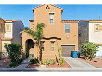 Charming two-story home with a landscaped front yard, driveway, and attached garage at 5380 Flowing Spring St, Las Vegas, NV 89122