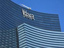 Exterior shot of Vdara Hotel & Spa featuring the Vdara logo against a clear blue sky at 2600 W Harmon Ave # 20034, Las Vegas, NV 89158
