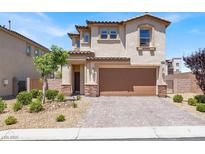 Two-story home featuring a brown garage door, stucco siding, and landscaped front yard at 3002 Coveri Ct, Las Vegas, NV 89141